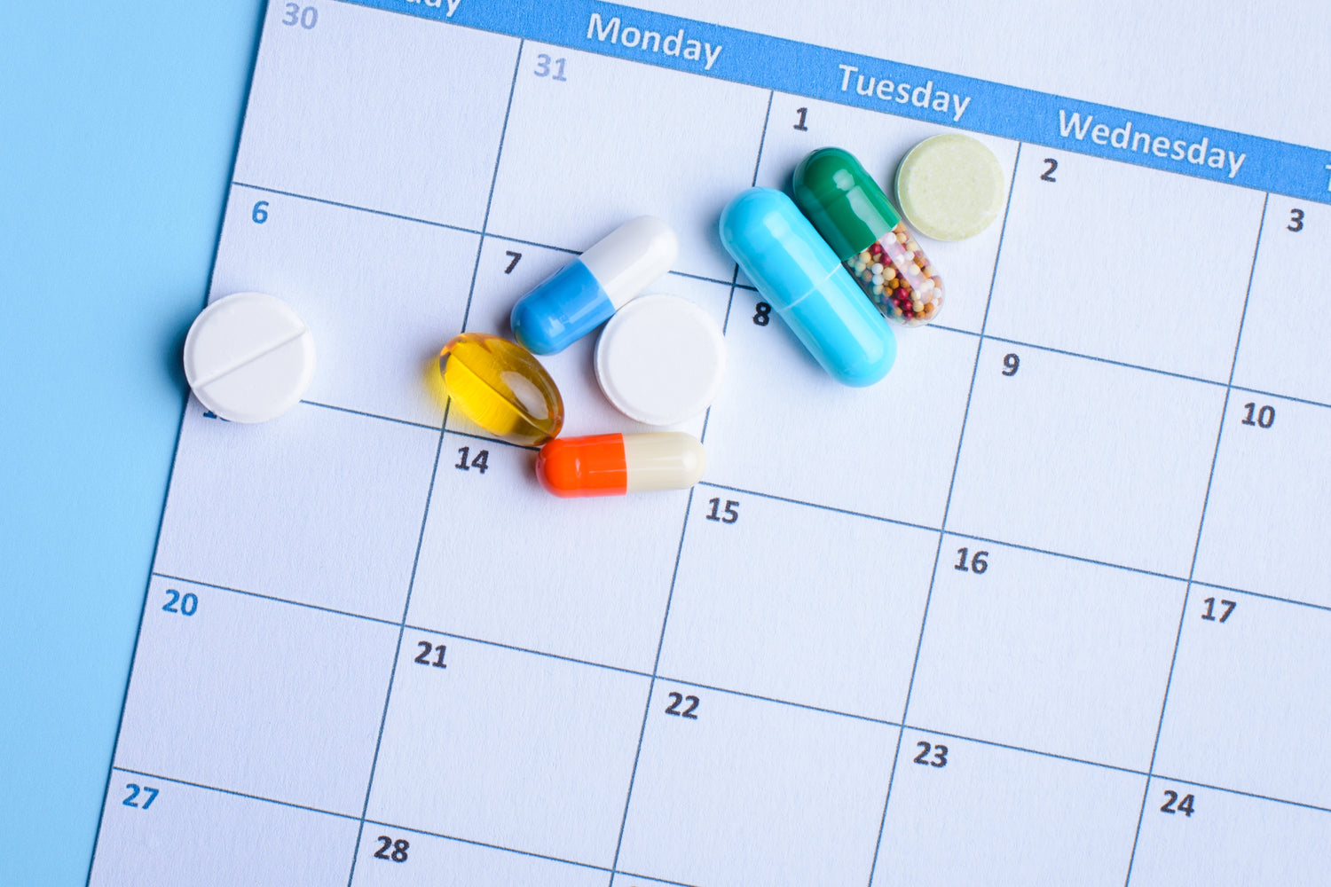 Various pills and capsules for medical treatment and supplementation.