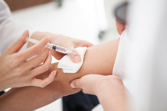 Vaccine administration as part of preventive healthcare to protect against diseases.